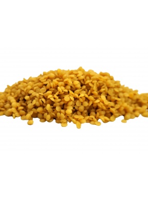 Cera de abeja amarilla en perlas.